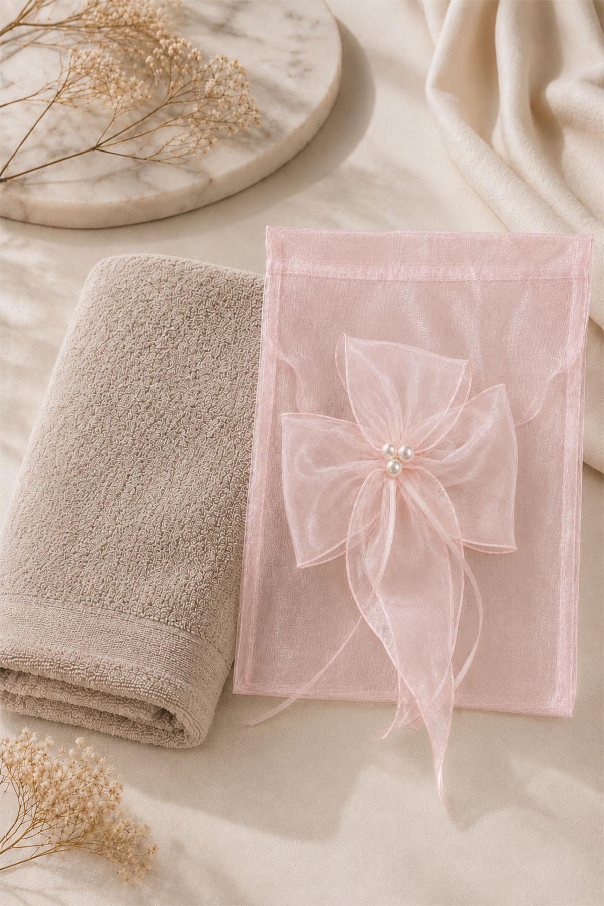 Sac cadeau orné de fleurs de perles