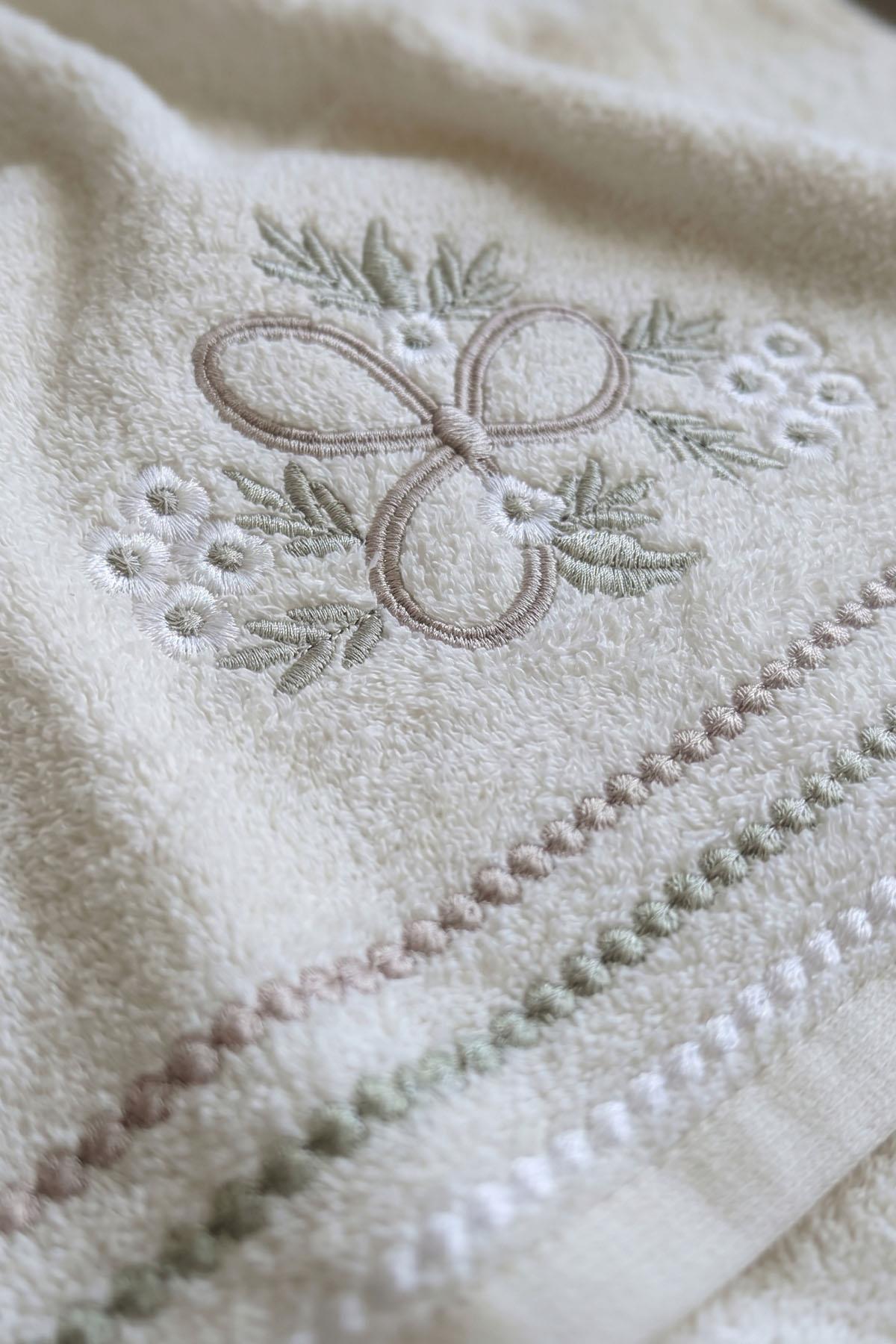 Essuie-mains brodé motif bougainvillier (30 x 50 cm)