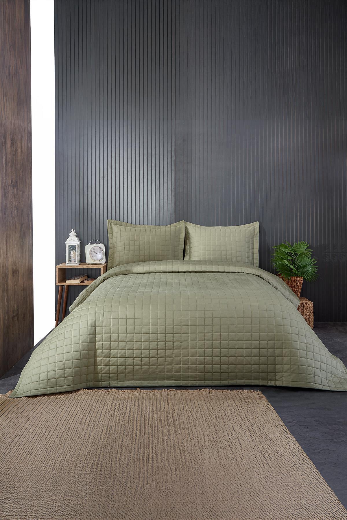 Couvre-lit double matelassé vert pour une décoration moderne dans la chambre à coucher