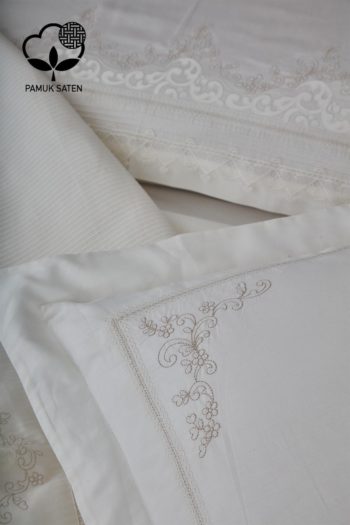 Détails de la parure de lit double en satin de coton blanc avec broderies rubis